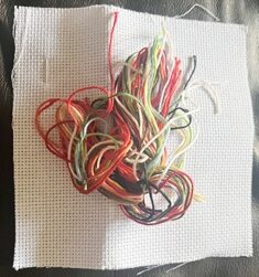 This is the 14 count aida, needle and  coloured threads that come inside the box.